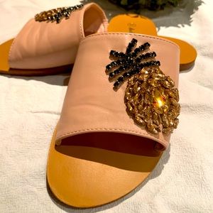 Nude pink flat sandals with crystals.